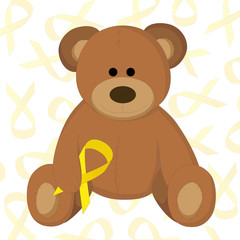 children's toy bear holding a yellow ribbon as a symbol of childhood cancer awareness