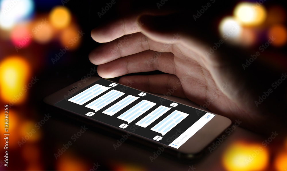 Poster chat bot , deep learning , artificial intelligence concept . finger point to mobile phone with chatb