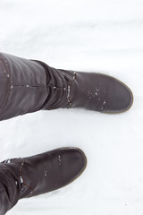 Leather Brown Boots in the snow.