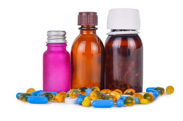 Various pills and bottles on a white background