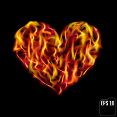 Obraz na płótnie Canvas Flaming heart isolated on black background. Love symbol.