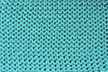 Fototapeta na wymiar Beautiful knitted background closeup