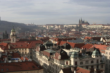 Fototapeta na wymiar The top view of Prague from the tower of the Old Town Hall, what is located on Old Town Square. 