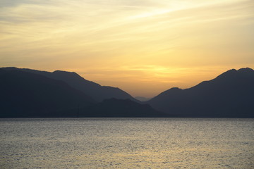 Scenic sunrise over the mountainous coast of the Mediterranean sea