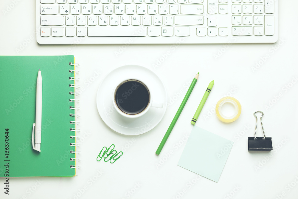 Poster keyboard,notebook and stationary on table