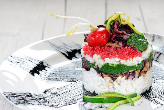 timballo di riso e verdure con uova di lompo