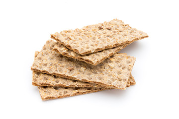 Stack of wholegrain crispy bread with sunflower, chia and sesame