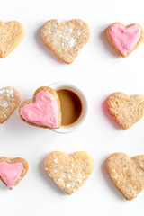 cookies for Valentine Day heartshaped white background top view pattern