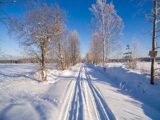 winter road intersection in the countryside with a bird's-eye view