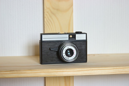 Old photo camera objective with low depth of field