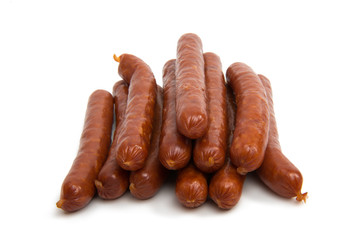dried sausages on white background