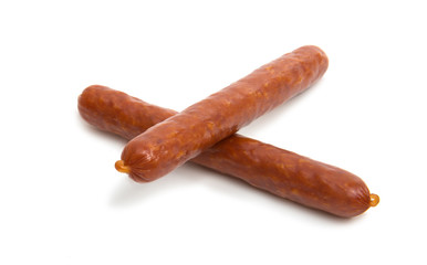 dried sausages on white background
