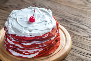 Red velvet crepe cake on the wooden board