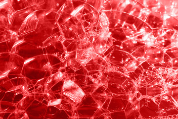 Abstract red background - bubbles in the form of a pattern. For any design, illustration, Wallpaper. Macro.