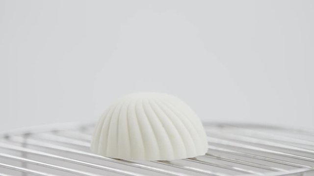 White cake in the form of seashell