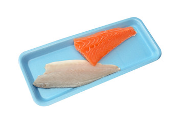 A blue polystyrene tray with a fresh salmon fish fillet and a cod fish fillet isolated. The fish is ready to be served fresh at a fish market.
