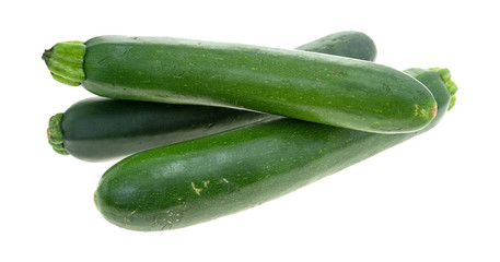 Three Italian squash isolated on a white background.
