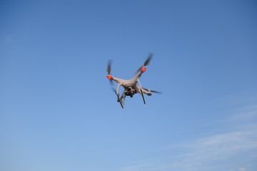 The drone, hovering in the sky. Flight quadrocopters