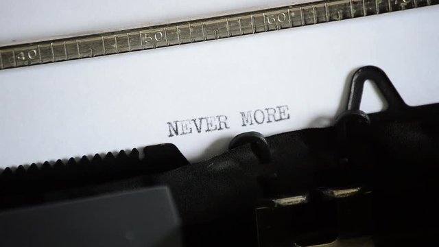Typing the expression NEVER MORE with an old manual typewriter