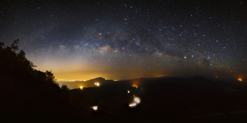 Obraz na płótnie Canvas Panorama Milky Way Galaxy at Doi inthanon Chiang mai, Thailand.L
