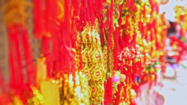 NHA TRANG, KHANH HOA/VIETNAM - JANUARY 26 2017: Close panorama red and  gold decorations for Vietnamese new year TET on street market on January 26 in Nha Trang
