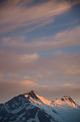 Mountain peak on sunset sky