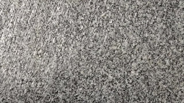 Agua Cayendo sobre una Superficie de  Piedra de Granito
