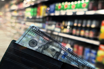 US Dollar cash banknote in wallet and shopping mall retail store or supermarket background. double exposure