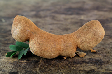 fresh sweet ripe tamarind with leaf, healthy fruit