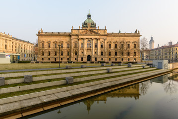 Fototapeta premium panoramic skyline of Leipzig with townhall and high court at sunset, Germany