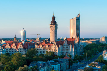 skyline of Leipzig with townhall and high court at sunset, Germany