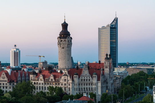 panoramic skyline of Leipzig with townhall and high court after sunset, Germany