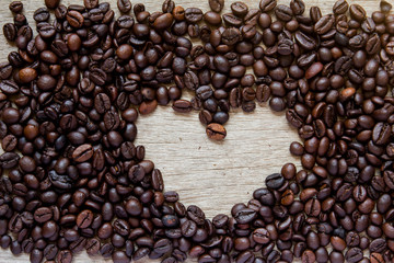 Coffee bean with blank space as heart shape background