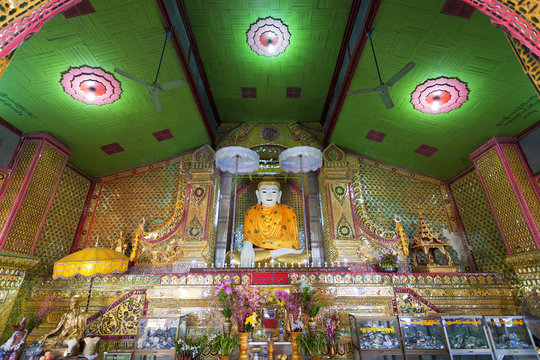 Colorful room with Buddha statue at Sutaungpyei Pagoda in Mandalay 