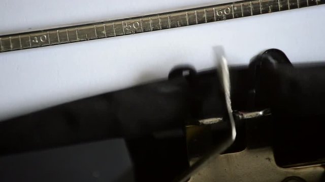 Typing the expression Erase una vez with an old manual typewriter