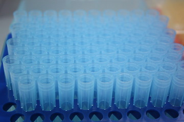 Blue tubes pack in a laboratory setting closeup