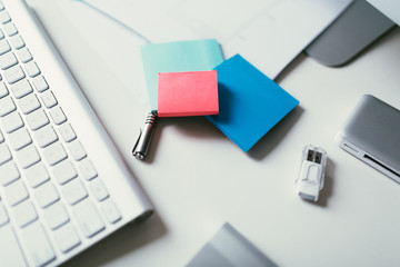 Computer desk with post-it notes