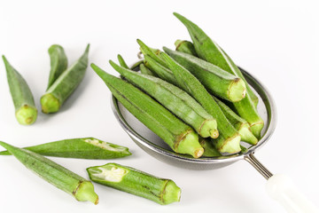 fresh whole and slice organic green okra, healthy vegetable