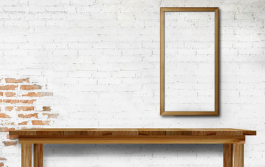 Mock up wooden table with white brick wall. For product display.