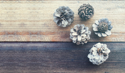 Soft Vintage filtered, Pine flower on wood table, flat lay, nature and relax concept