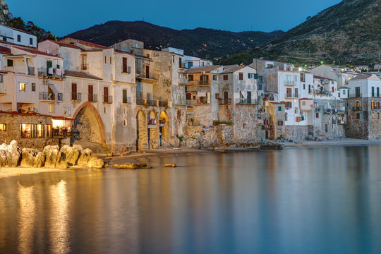 The old town of Cefalu in Sicily reaches right to the beach