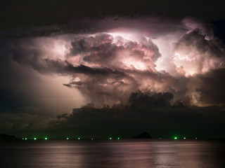 Mostly cloudy with lightning storm inside