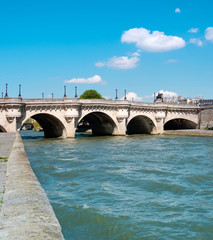 Pont Neuf bridge on Seine river in Paris, France,