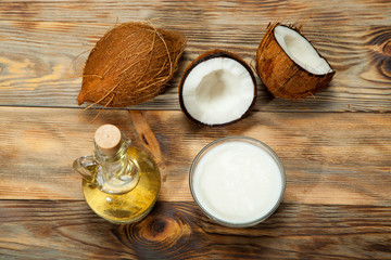 Coconut oil,  on a wooden background