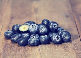 blueberry on wooden background.