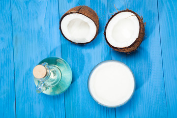 Coconut oil on a blue wooden background