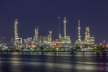 Fototapeta na wymiar Night scene of oil refinery plant of Petrochemistry industry in