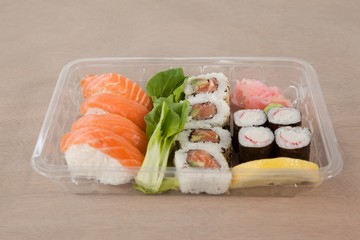 Set of assorted sushi kept in a plastic box