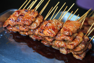 Barbe-que pork in wooden stick