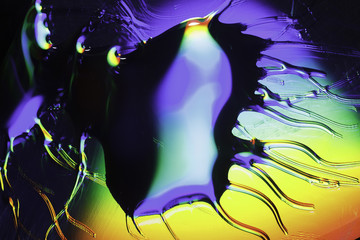 Plenty of colorful drops on the rainbow background
